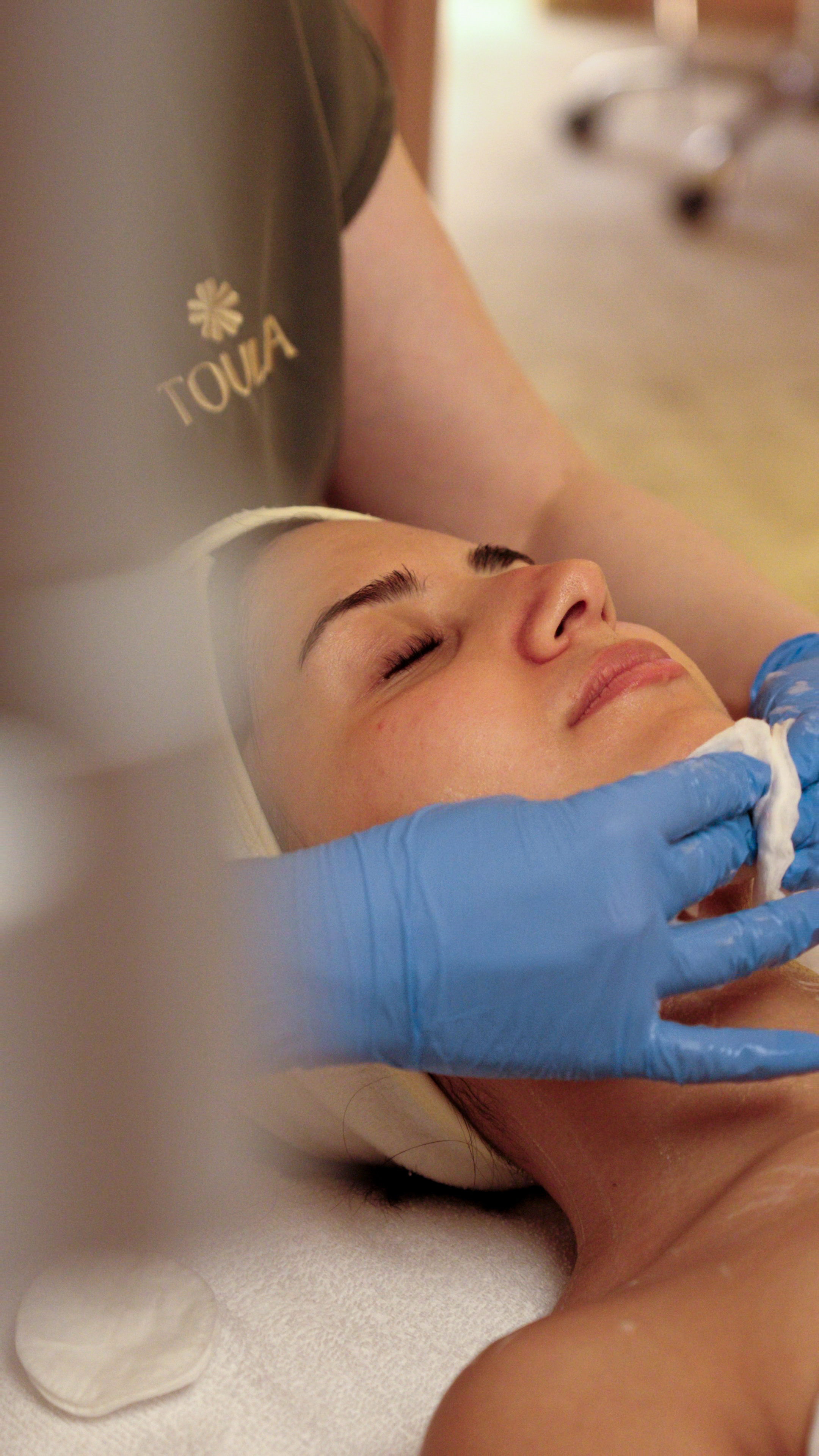 Editorial close-up of a facial treatment
